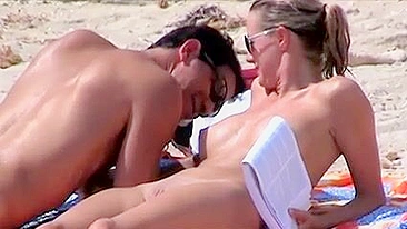 Sexy, Bountiful, And Tittilatingly Topless Beach Babe