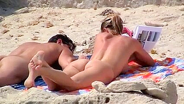 Sexy, Bountiful, And Tittilatingly Topless Beach Babe