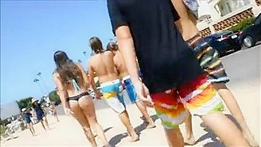 Sexy, Bikini-Clad Girl Sunbathing On Beach Caught On Candid Cam