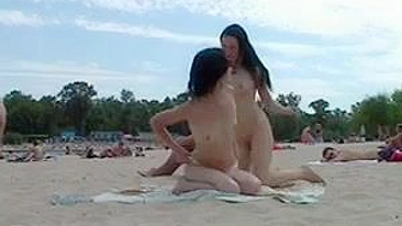 Nudists Video at the Beach Doing Together a Naked Sunbath