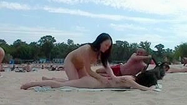 Nudists Video at the Beach Doing Together a Naked Sunbath