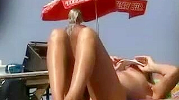 Hot Naked Pussy Video at the Beach Filmed on Voyeur Camera