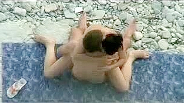 Sexy Beach Bang? Naughty Young Couple Caught In Risque Act!