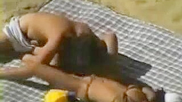 Lewd Beach Couple's Raunchy Sex Act In This Amateur Voyeur Video