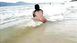 Nude Big Latina Ass Filmed at the Beach