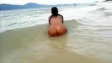 Nude Big Latina Ass Filmed at the Beach