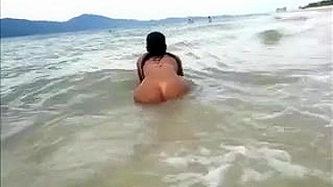 Nude Big Latina Ass Filmed at the Beach