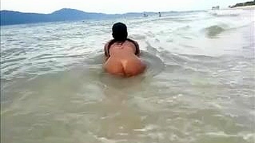 Nude Big Latina Ass Filmed at the Beach