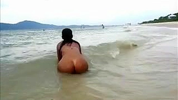 Nude Big Latina Ass Filmed at the Beach