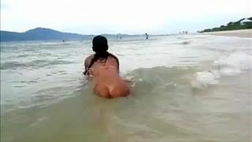 Nude Big Latina Ass Filmed at the Beach