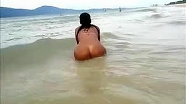 Nude Big Latina Ass Filmed at the Beach