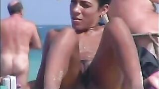 Privately Viewing Sexy Beach Vid, Feminine Pussies On Display