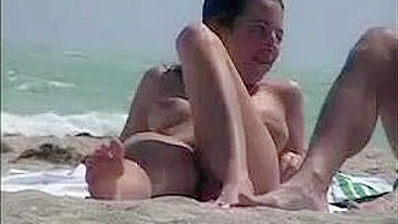 Privately Viewing Sexy Beach Vid, Feminine Pussies On Display