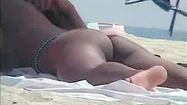 Privately Viewing Sexy Beach Vid, Feminine Pussies On Display