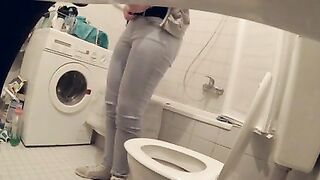 Sneaky Hidden Camera Captures Girls' Peeing Moments In Bathroom