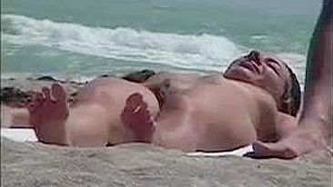 Sneaky Nude Beach Video With Sexy Woman Exposing Her Boobs On The Beach