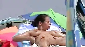 Sneaky Voyeur Captures Nude Beach Bodies On Video