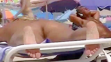 Sneaky Voyeur Captures Nude Beach Bodies On Video