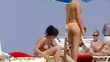 Sneaky Voyeur Captures Nude Beach Bodies On Video