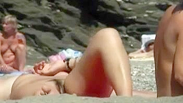 Sneaky Voyeur Camera Captures Real Nudist Beach Video