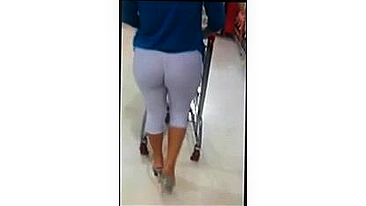 Sexy Milf In Tight White Leggings Sneakily Spied On By Candid Camera In Store