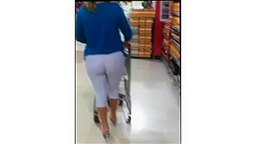 Sexy Milf In Tight White Leggings Sneakily Spied On By Candid Camera In Store