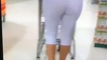 Sexy Milf In Tight White Leggings Sneakily Spied On By Candid Camera In Store