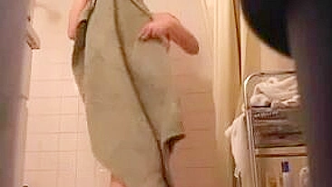 Spy Cam In Bathroom Films Busty Girl Showering