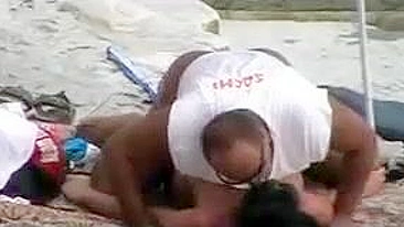 Mature Couple Caught on Hidden Voyeur Cam Having Sex at Beach
