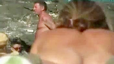 Sneaky Voyeur Captures Explicit Beach Video Of Real Nudists