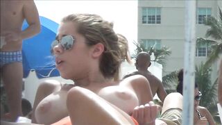 Voyeur Beach Video Girl with Awesome Big Tits Doing Topless