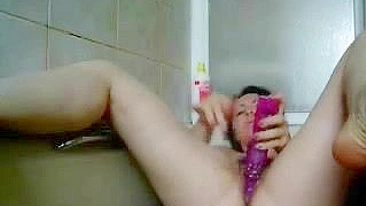 Mature Mom Having Fun In The Bath Tube With Dildo