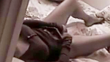 Watching Video Of Friends' Horny Mom Pleasuring Her Pussy In Bed
