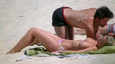 Sexy Topless Beach Girl Flaunts Her Big Bouncing Tits In A Tiny Bikini