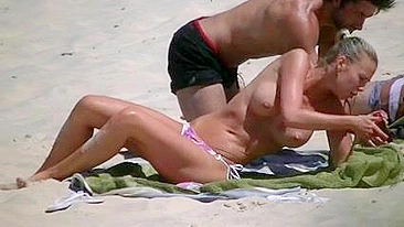 Sexy Topless Beach Girl Flaunts Her Big Bouncing Tits In A Tiny Bikini