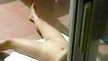 Female Neighbor Caught Doing Nude Sunbating