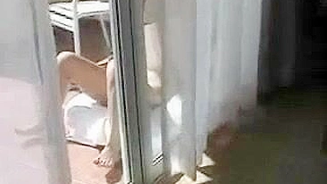 Female Neighbor Caught Doing Nude Sunbating