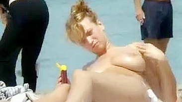 Sexy Girl With Big Boobs Oils Herself At Public Beach