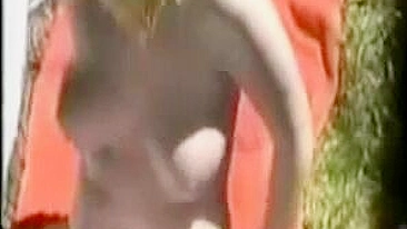 Scandalous! Peeping Woman Sunbathing Topless On Spycam