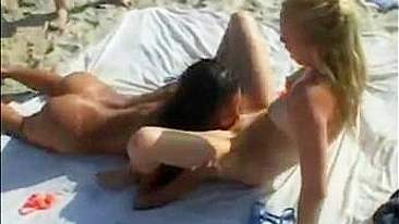 Sultry Topless Lesbians On The Beach, Enjoy Sunbathing In A Fantastic Video!