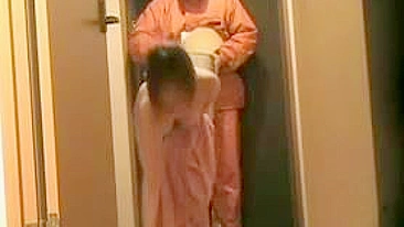 Asian Lady Flashes At The Door Secret Camera