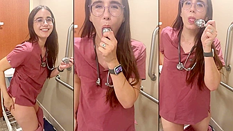 Naughty nurse playing with plug ass in the hospital toilet