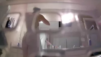 A hidden camera catches my naked sister in the shower