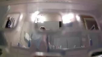 A hidden camera catches my naked sister in the shower