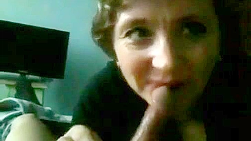 Mommy wants to play with his cock and she is sucking it attentively