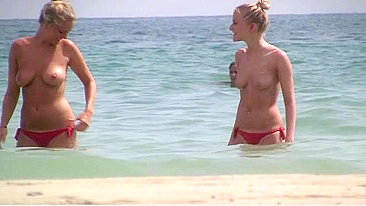 Sister vacation teasing with lots of amazing topless shots on the beach