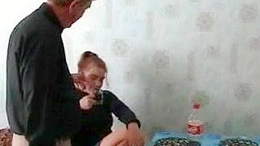 Real daddy with a real hard cock is going to screw her oozing twat