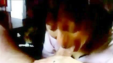 Gorgeous mom with curly hair is going to suck on that meaty boner too