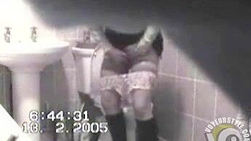 MILF in tight dress rubs her hairy pussy after the piss, but spy camera catch it all!