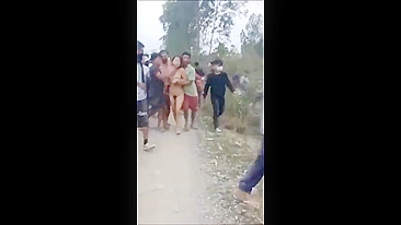 Two crying indian women stripped naked & gang raped